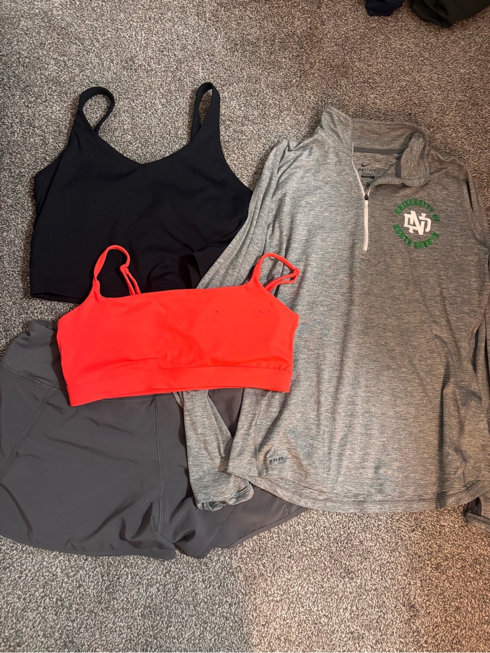 Gray Quarter-Zip Pullover with Green Logo + Black and Coral Sports Bras + Shorts